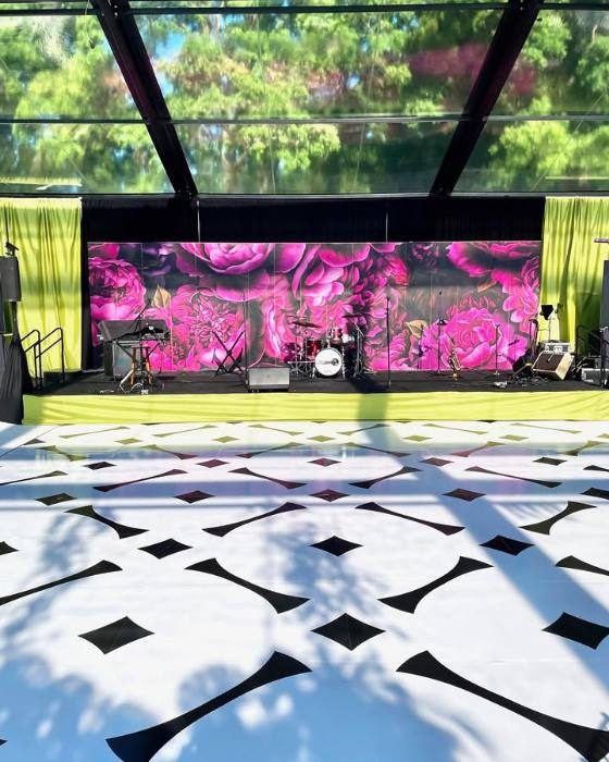 Geometric black and white floor wrap installed at The Mint Museum