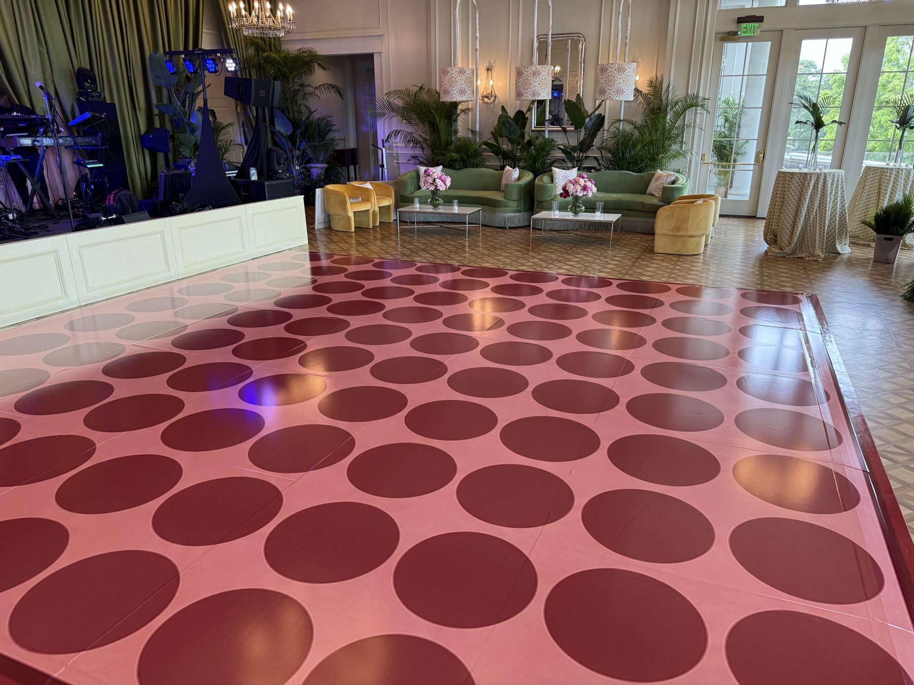 Pink dance floor wrap with deep red polka dots at Myers Park Country Club, Charlotte